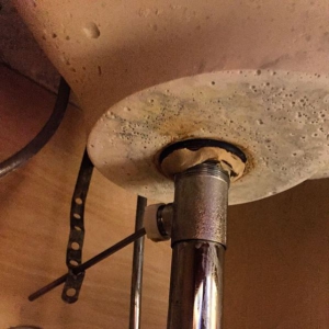 using Plumbers putty under the sink